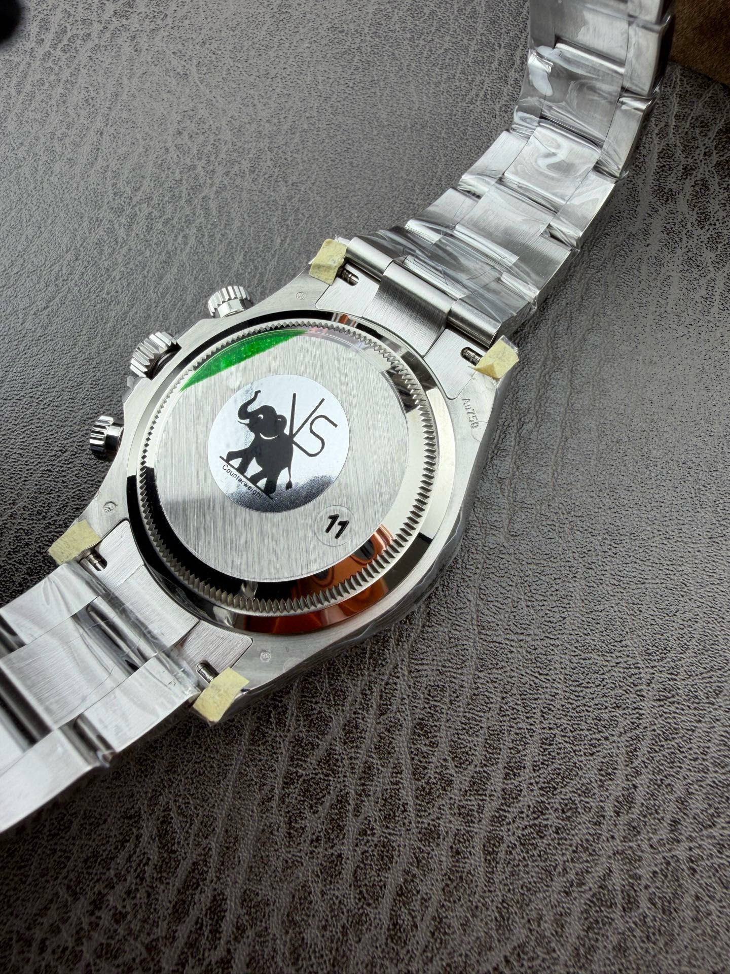 Caseback view of the VSF Daytona showing the brushed center and deep Au750 lug hallmarks